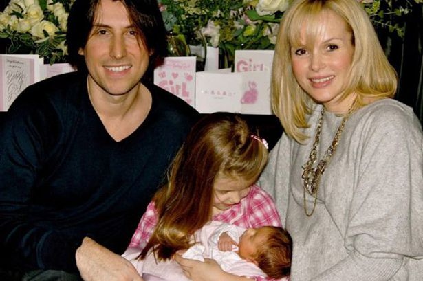 Amanda Holden with her husband Chris Hughes and daughters Lexi and Hollie