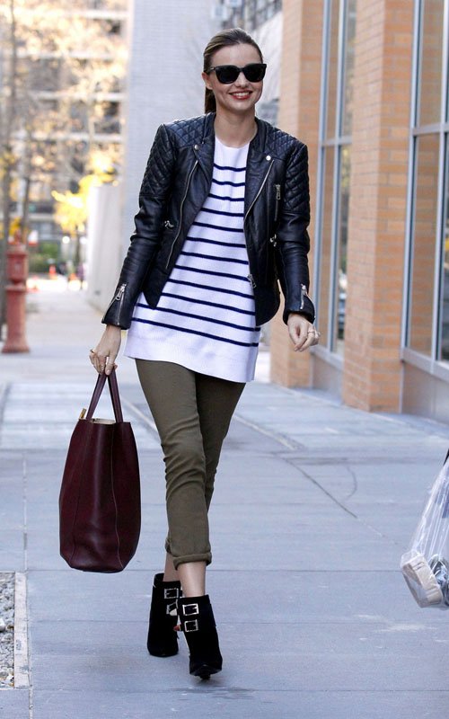 Miranda Kerr wearing Balenciaga Leather Biker Jacket and The RowStriped Cashmere Sweater