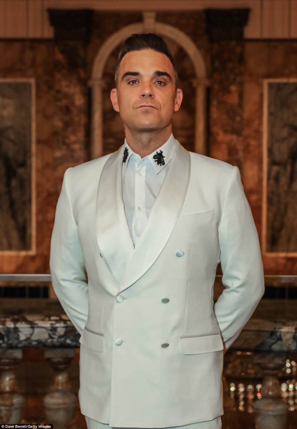http://i.dailymail.co.uk/i/pix/2016/10/11/07/394A424F00000578-3831598-Rock_star_Robbie_Williams_was_a_late_comer_at_the_bash_as_he_shu-a-24_1476168221483.jpg