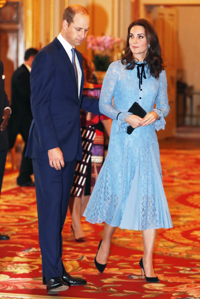 kate-middleton-just-debuted-her-baby-bump-in-a-pretty-lace-dress-2457884.640x0c